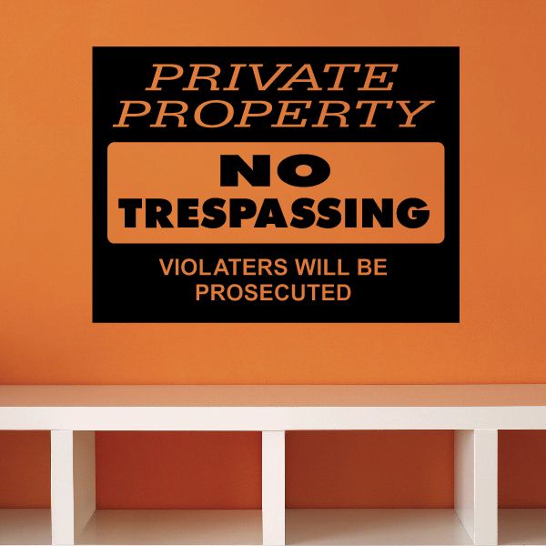Private property no trespassing wall decal, black with gold text and 'Violators will be prosecuted'