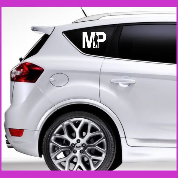 Black MP car decal with white letters on rear side window