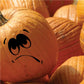 Pumpkin bored face decal with black lazy eyes and mouth on orange pumpkin