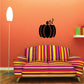 Black pumpkin wall decal with curled stem and outlined leaves