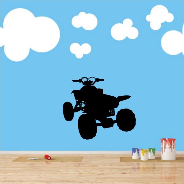 Black quad ATV wall decal with white cloud shapes