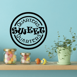 Sweet Quarters circle decal with black border and lettering