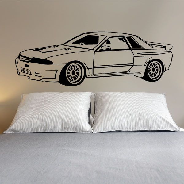 Car decal of a white and black sports coupe with racing details