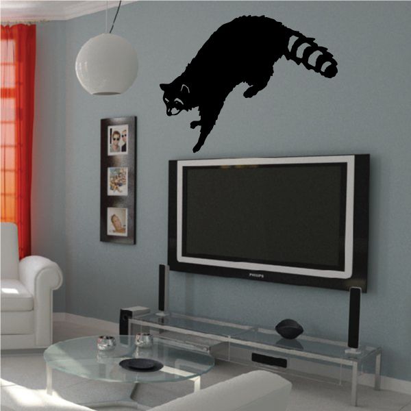 Image of Raccoon Climbing Over Decal