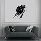 Black raccoon wall decal, sitting and staring on edge