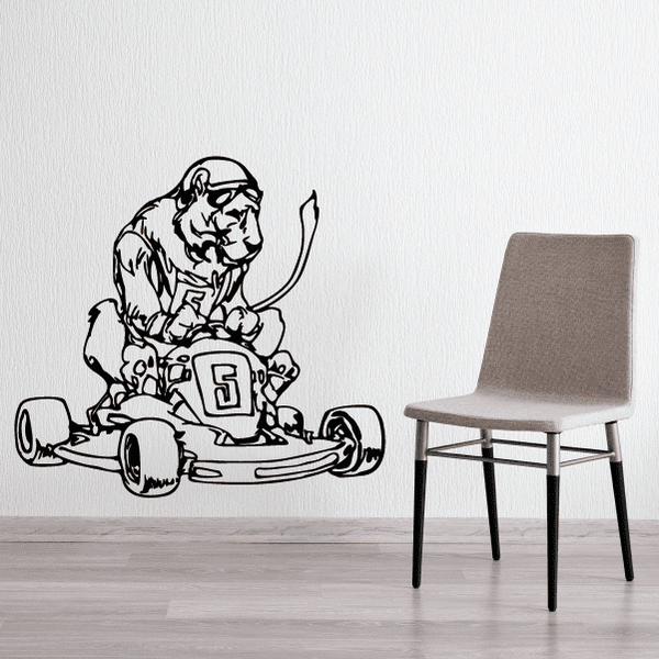 Race car wall decal of driver mascot with number 5 on racecar, black vinyl.