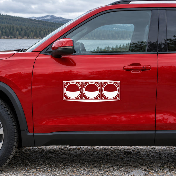 Horizontal three-light wedge vinyl decal with three circular light icons on a car door