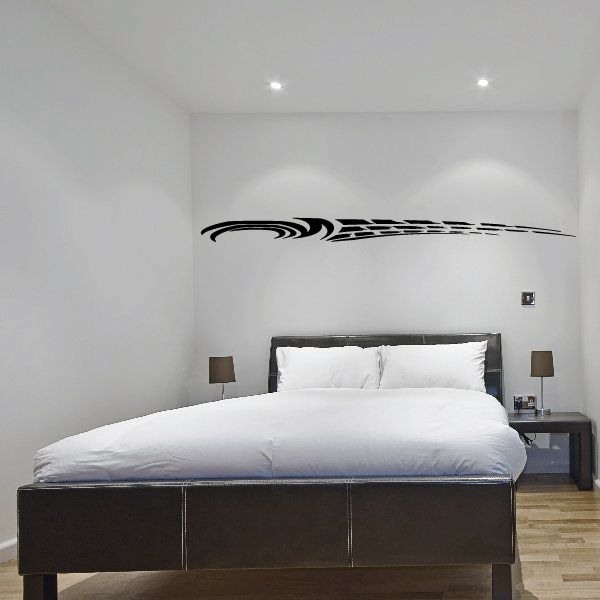 Racing pinstripe vinyl decal with black swoosh lines on wall