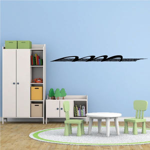 Black racing vehicle pinstripe vinyl decal with long streak and wheel shapes