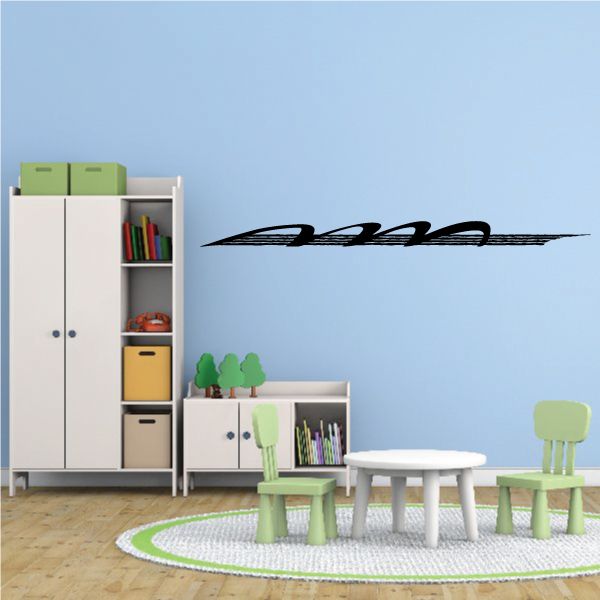 Black racing vehicle pinstripe vinyl decal with long streak and wheel shapes
