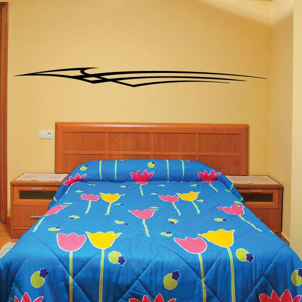 Black racing pinstripe vinyl decal on wall above bed