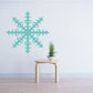 Radiating snowflake wall decal in light teal