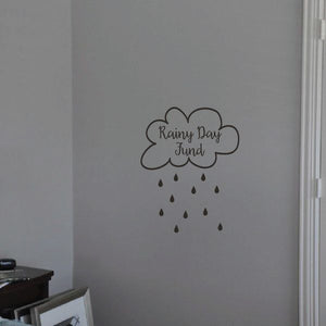 Cloud-shaped 'Rainy Day Fund' decal with raindrops