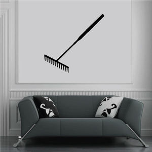Rake wall decal with black outline illustration of a garden rake