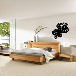 Coiled rattle snake wall decal, black patterned design