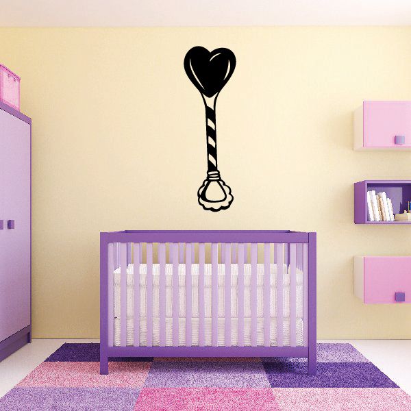Wall decal vinyl: black baby rattle with heart at top