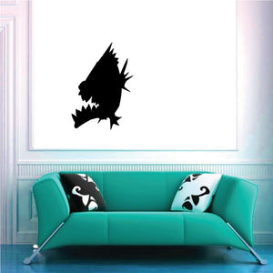 Black piranha silhouette wall decal with razor teeth and fin details