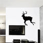 Reindeer dashing wall decal featuring a black leaping reindeer silhouette.