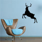 Galloping reindeer wall decal with black silhouette