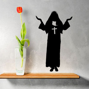 Black nun silhouette wall decal with cross and flowing dress