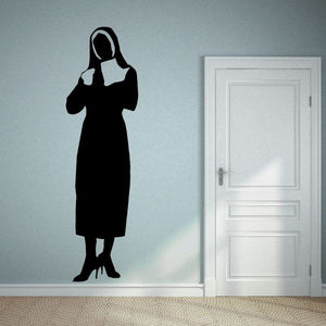 Black nun religious decal silhouette, hooded habit with clasped hands