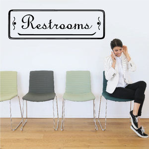 Restrooms wall decal with decorative script text