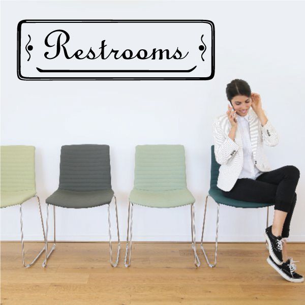 Restrooms wall decal with decorative script text