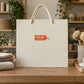 Orange special offer sign sticker with white text on a shopping bag