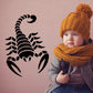 Black scorpion decal with segmented body and claws