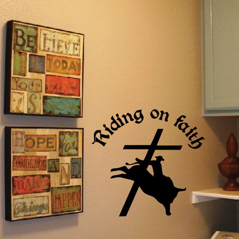 Bull rider decal with “Riding on faith” script, cross, and cowboy silhouette on bull