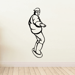 Snowboarding decal of a helmeted rider crouching on a board