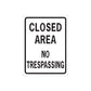 Road sign wall decal with CLOSED AREA NO TRESPASSING text