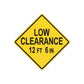 Yellow road sign vinyl decal with text "LOW CLEARANCE 12 FT 6 IN"
