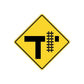 Road sign vinyl sticker: yellow diamond with black T and grid blocks