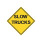 Yellow diamond road sign sticker reading SLOW TRUCKS with black border