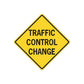 Yellow diamond road sign sticker with black border reading 'TRAFFIC CONTROL CHANGE'