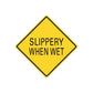 Road sign wall decal: yellow diamond with black border text “SLIPPERY WHEN WET”