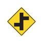 Yellow road sign decal with black cross and directional arrows