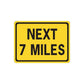 Yellow road sign wall decal vinyl with black border, NEXT and 7 MILES text