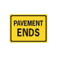 Yellow road sign decal with black border and 'PAVEMENT ENDS' text
