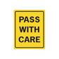 Yellow road sign decal with black border and text 'PASS WITH CARE'