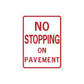Road sign decal sticker: 'NO STOPPING ON PAVEMENT' in red