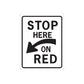 Vinyl road sign wall decal with STOP HERE ON RED text and left arrow