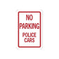 Road sign vinyl sticker with red border reading 'NO PARKING POLICE CARS'.