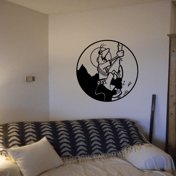 Circular rock climbing wall decal with black cartoon climber holding rope and gear