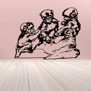 Rock climbing wall vinyl decal of three muscular climbers in rock pose