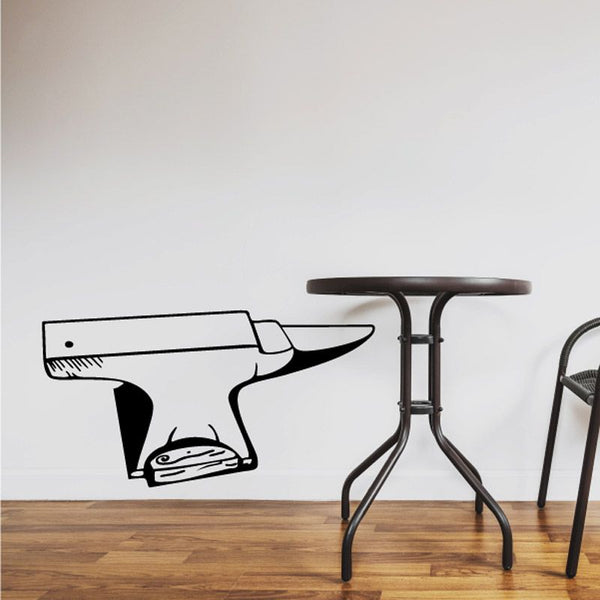 Vinyl wall decal with black outline of a handgun and boot
