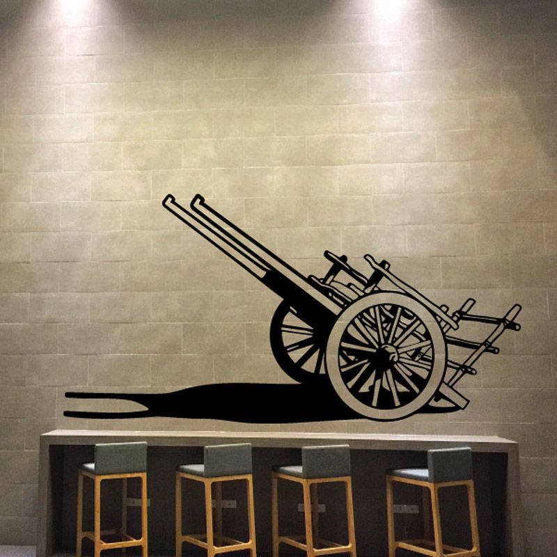 Vinyl wall decal of a black cannon with wheels and carriage