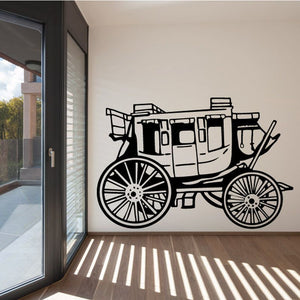 Black vinyl wall decal of a vintage carriage with large spoked wheels