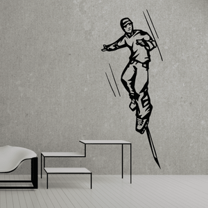 Black rollerblading wall decal sticker of a skater with motion lines.